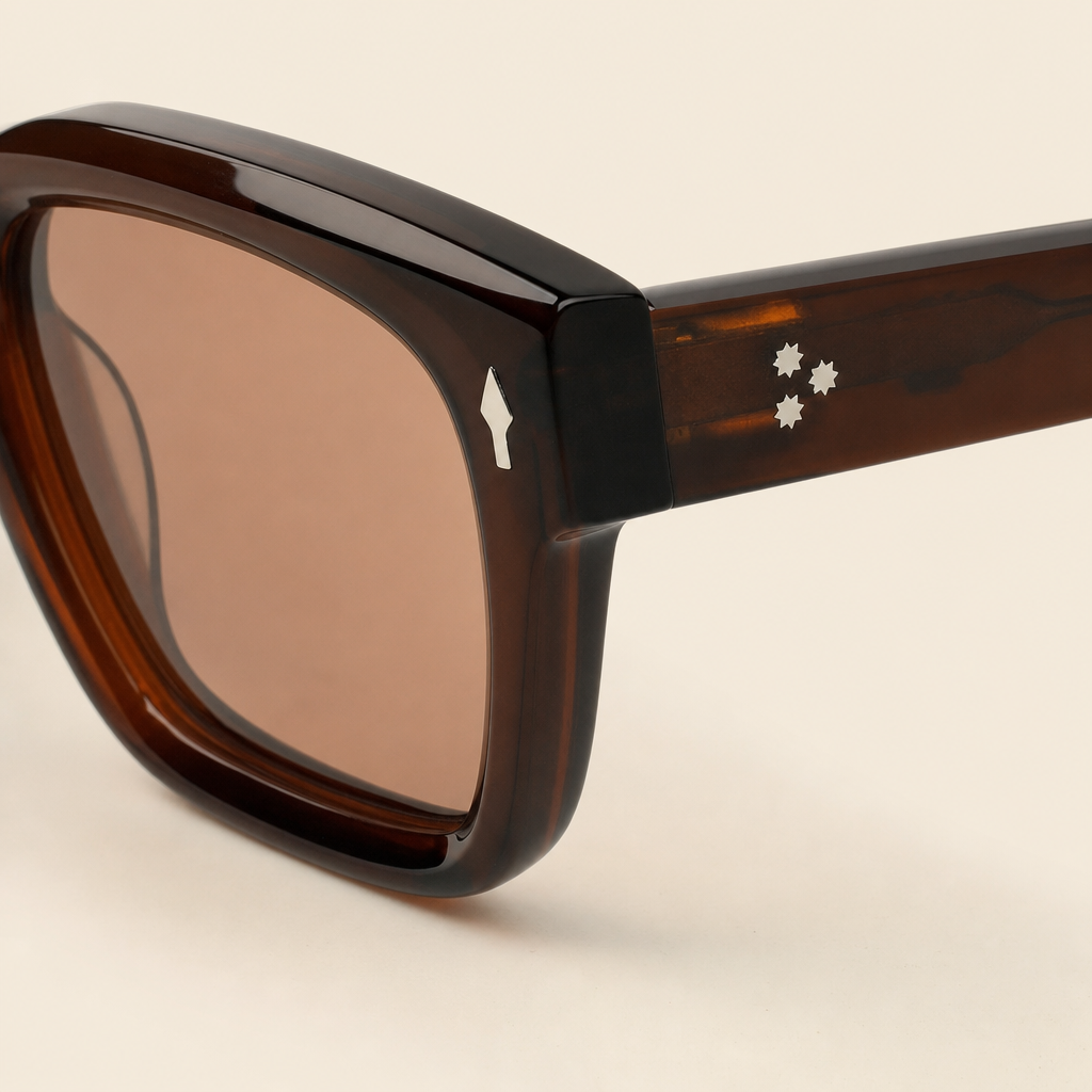 FRONT VIEW OF 2005 SAGE DEEP BROWN ACETATE SUNGLASSES WITH SOFT BROWN LENSES.