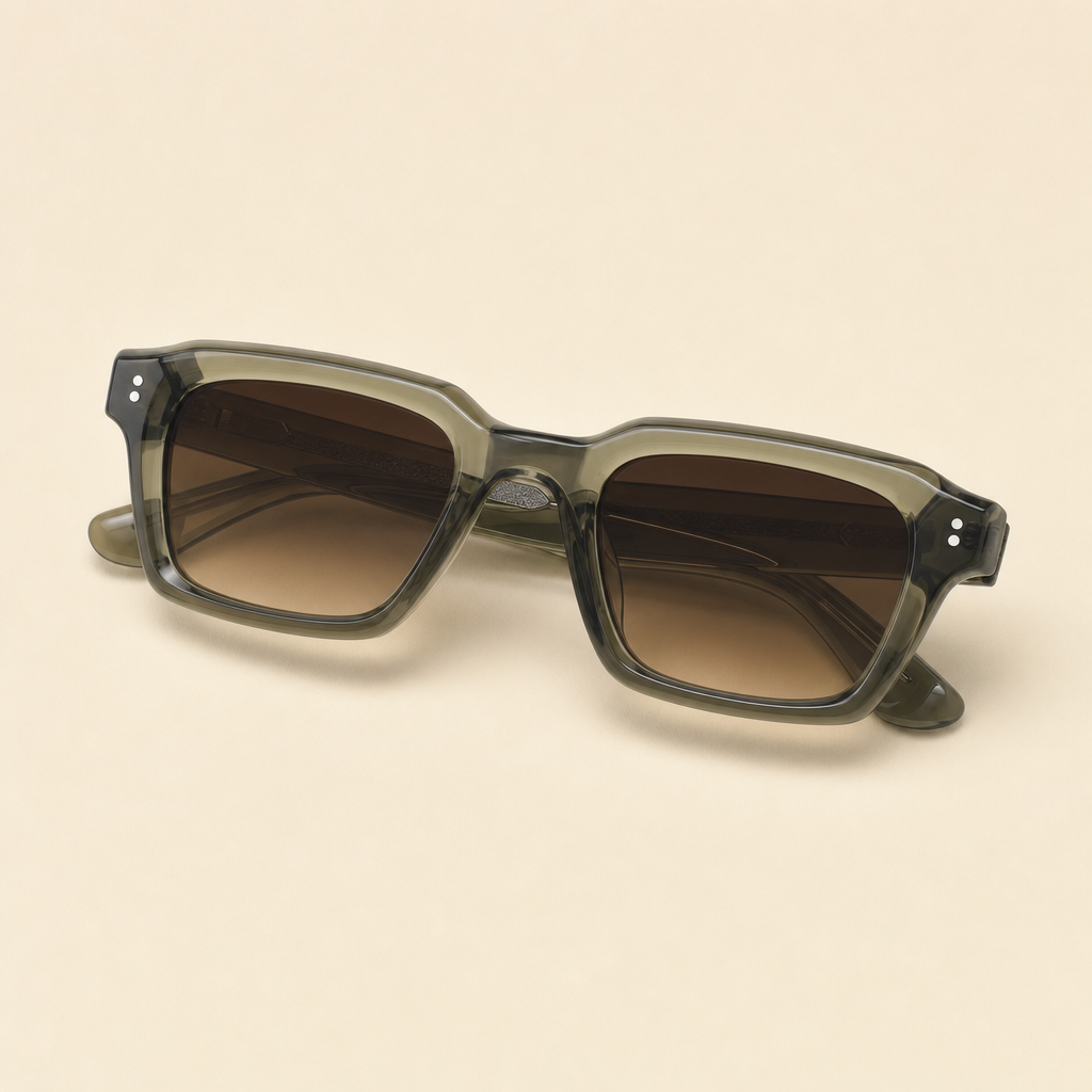 THREE-QUARTER VIEW OF 2005 AMBER SQUARE SUNGLASSES IN TRANSLUCENT OLIVE-GREEN ACETATE.